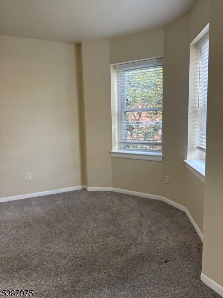 46 James Street, Unit 2 Newark, NJ 07102 - Photo 8 of 12 an empty room with windows