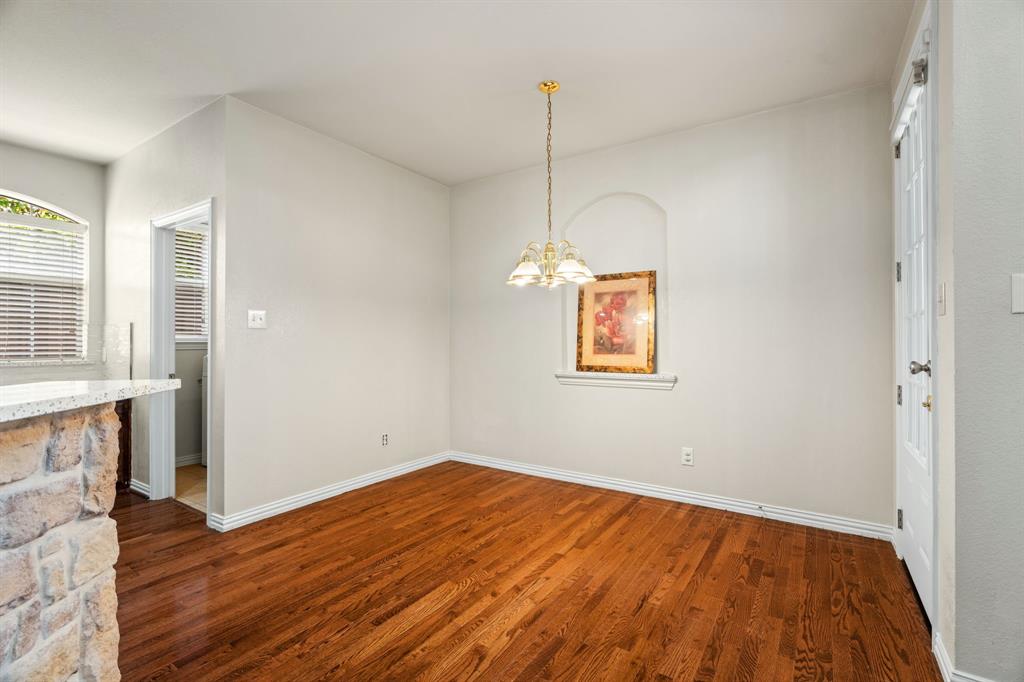 2012 Burnside Drive Allen, TX 75013 - Photo 28 of 40 a view of empty room with wooden floor and fan
