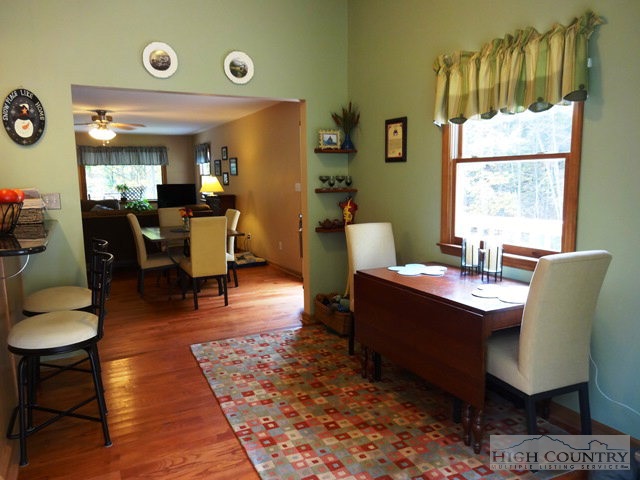 158 Jesse Brown Road Boone, NC 28607 - Photo 15 of 18 a living room with furniture a rug and a window