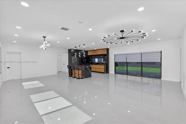 an aerial view of a house with a garden