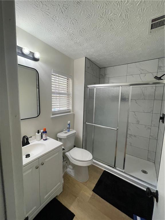 3915 Basil Way Southwest Atlanta, GA 30331 - Photo 17 of 21 a bathroom with a sink a toilet and shower