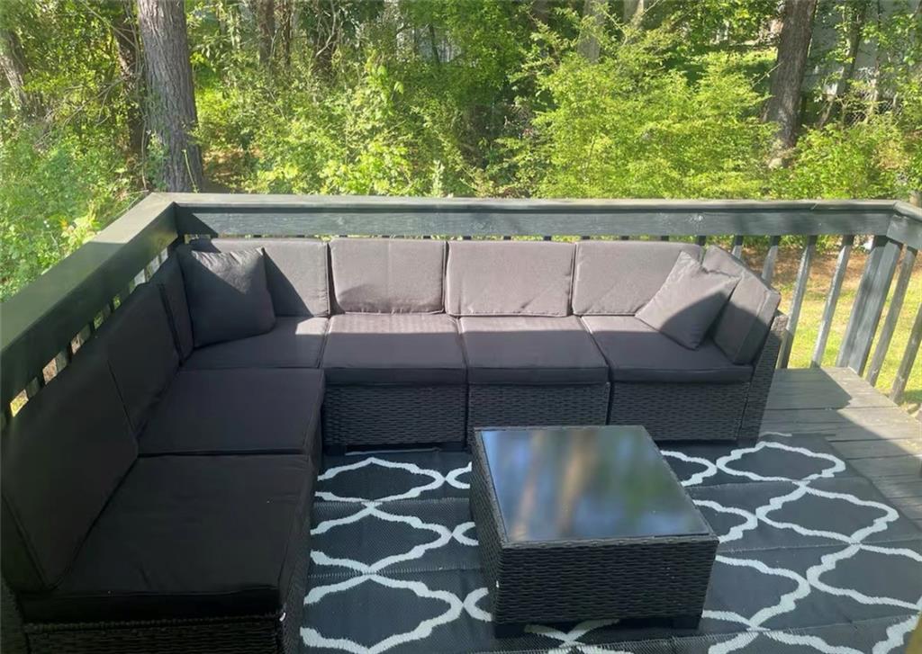 3915 Basil Way Southwest Atlanta, GA 30331 - Photo 21 of 21 a balcony with table and chairs