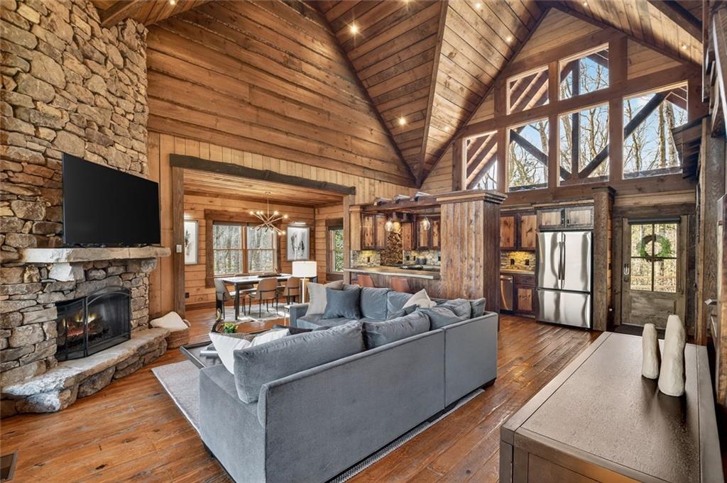 249 Settlement Road Epworth, GA 30541 - Photo 19 of 74 a living room with fireplace furniture and a flat screen tv
