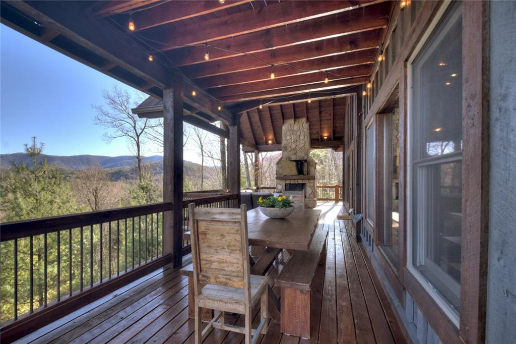 249 Settlement Road Epworth, GA 30541 - Photo 43 of 74 a view of a chairs and table in the balcony