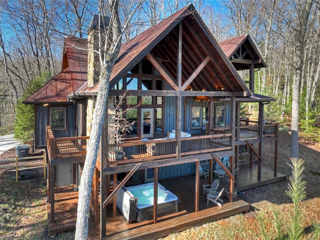 249 Settlement Road Epworth, GA 30541 - Photo 69 of 74 a view of house with swimming pool and porch