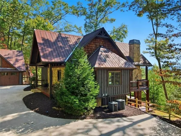 a front view of a house with garage