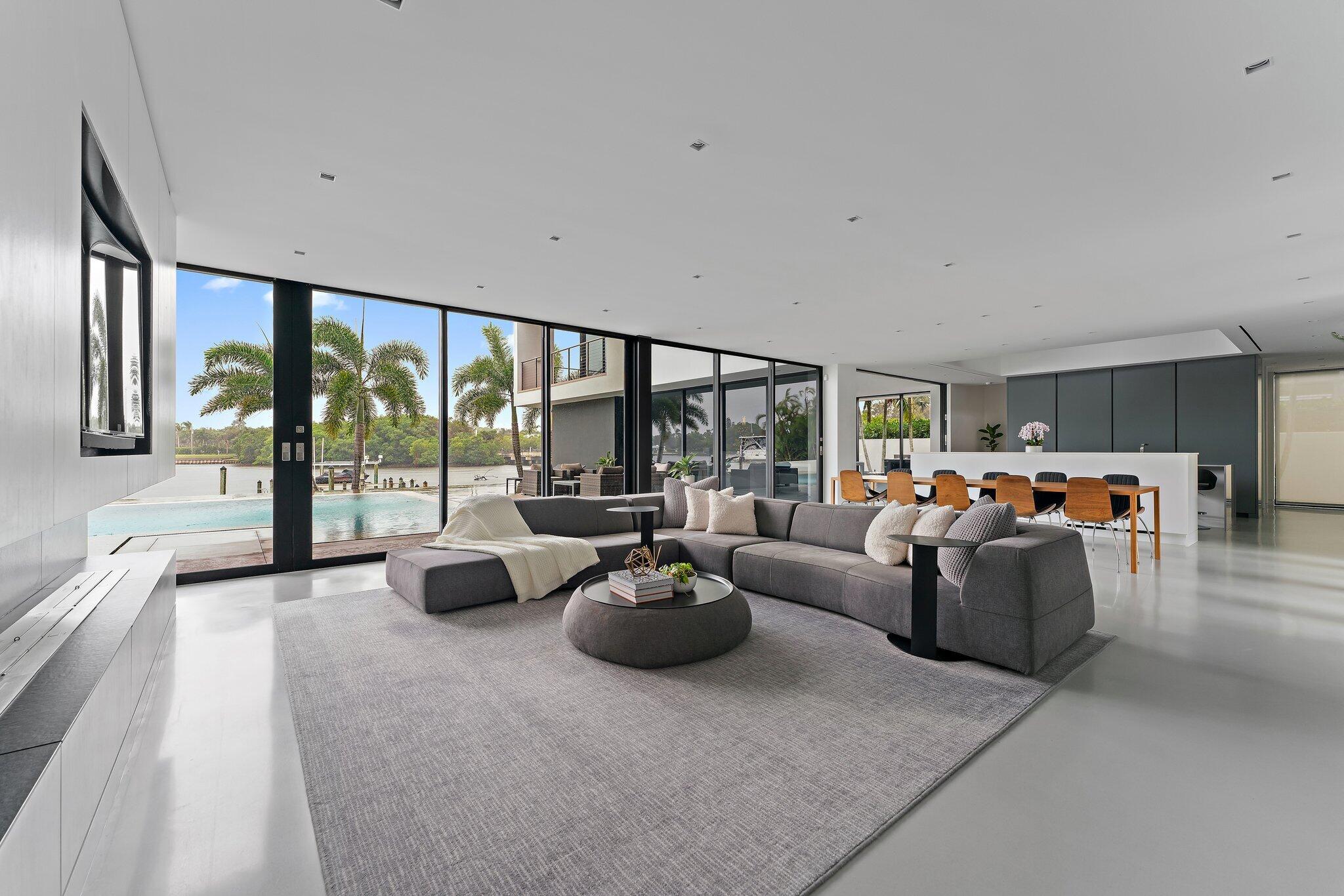 5706 Holly Lane Jupiter, FL 33458 - Photo 13 of 34 a living room with furniture and a large window