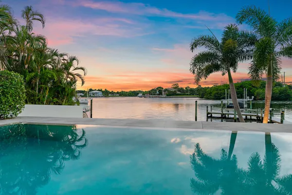 a view of a house with a swimming pool