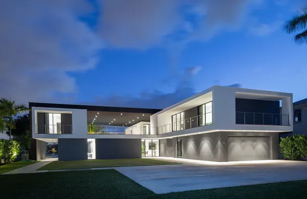 a view of house with a yard