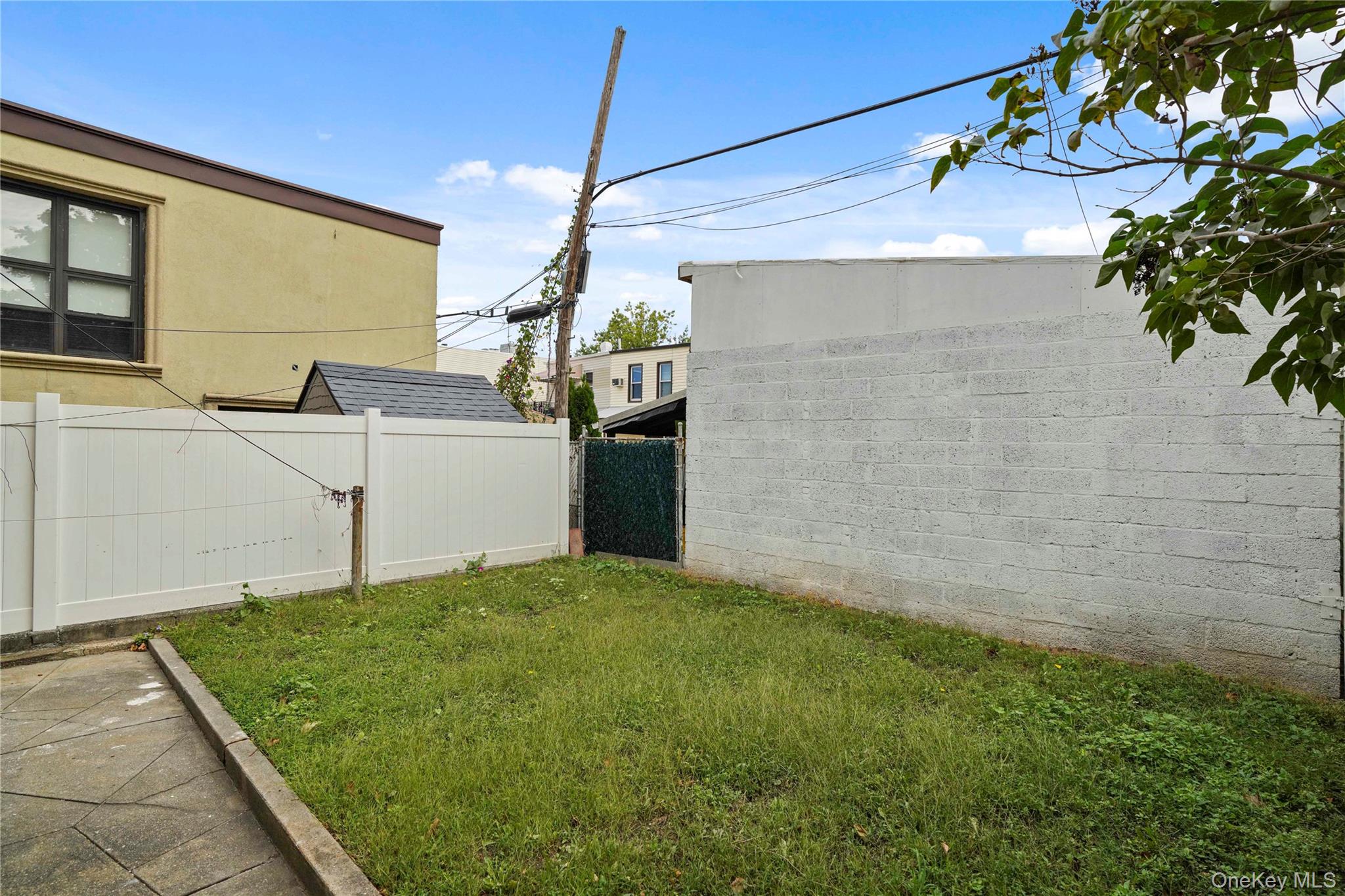 72-07 73rd Street Queens, NY 11385 - Photo 4 of 49 View of yard