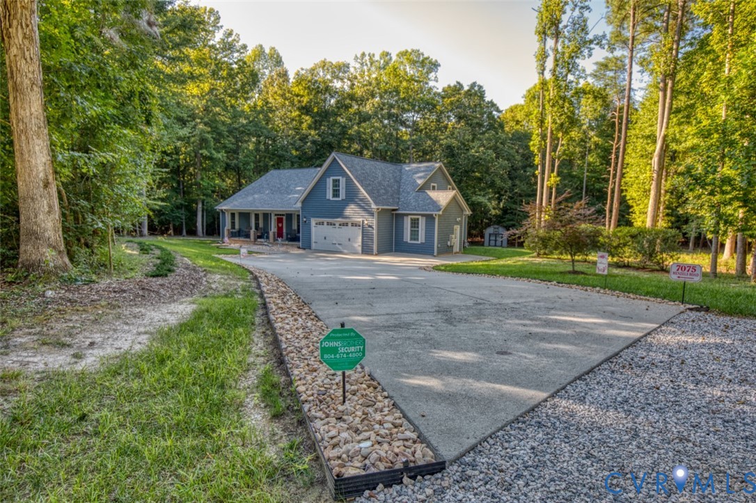 7075 Menzels Road Toano, VA 23168 - Photo 1 of 50 Gray siding exterior with white trim, covered fron
