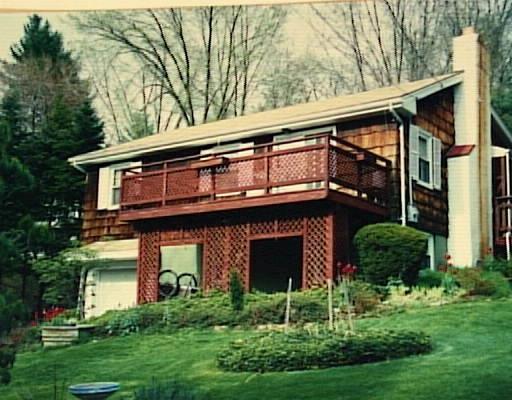 8 Pleasant View Road Sherman, CT 06784 - Photo 1 of 1 a house view with a garden space