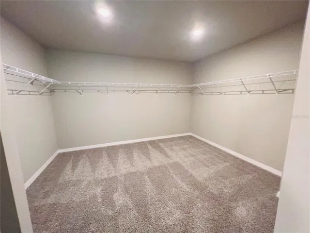 a view of a bathroom with a toilet