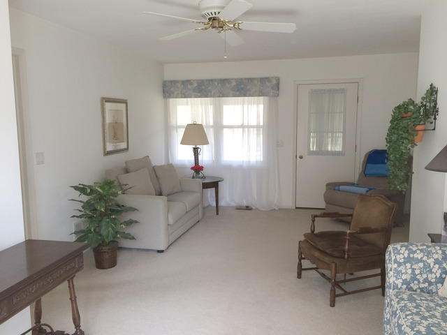 1241 Telegraph Road Lake Forest, IL 60045 - Photo 6 of 10 a living room with furniture and a chandelier