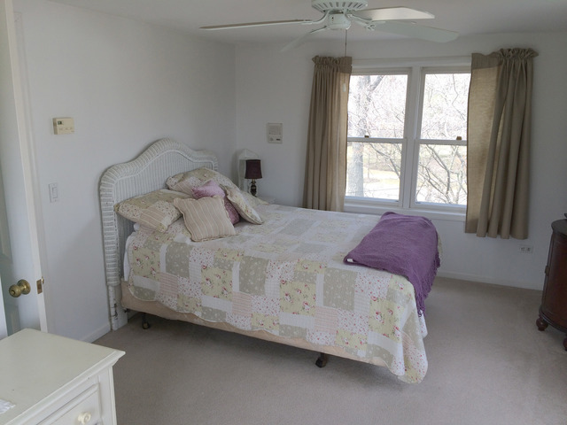 1241 Telegraph Road Lake Forest, IL 60045 - Photo 8 of 10 a bedroom with a bed and a window