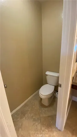 a view of a porch with chairs and furniture