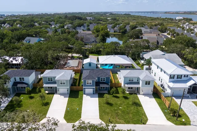 an aerial view of multiple houses