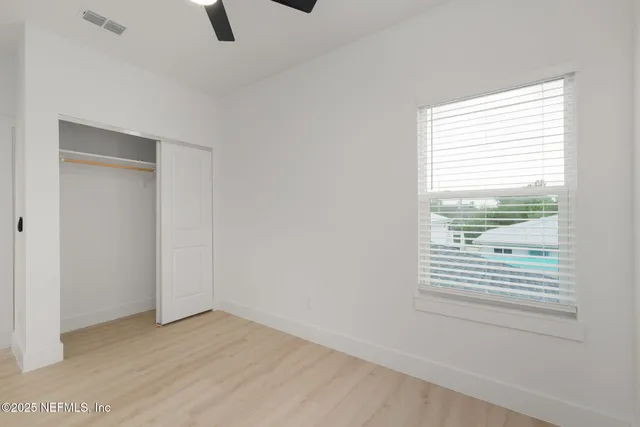 an empty room with window