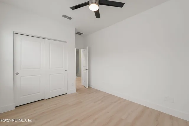 a view of an empty room and window