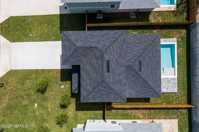 a aerial view of a house with a garden