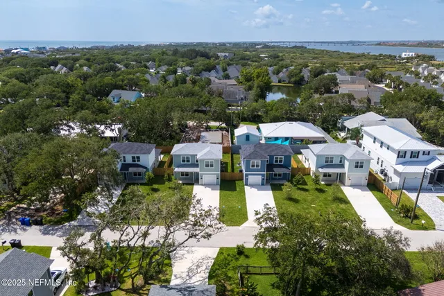 an aerial view of multiple house