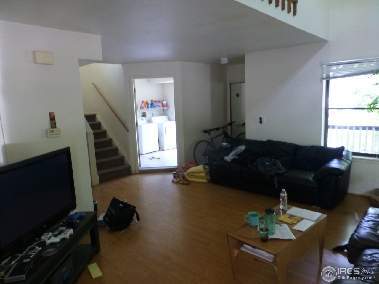 1835 Baseline Road Boulder, CO 80302 - Photo 15 of 39 Main lvl liv rm view to laundry rm & front door