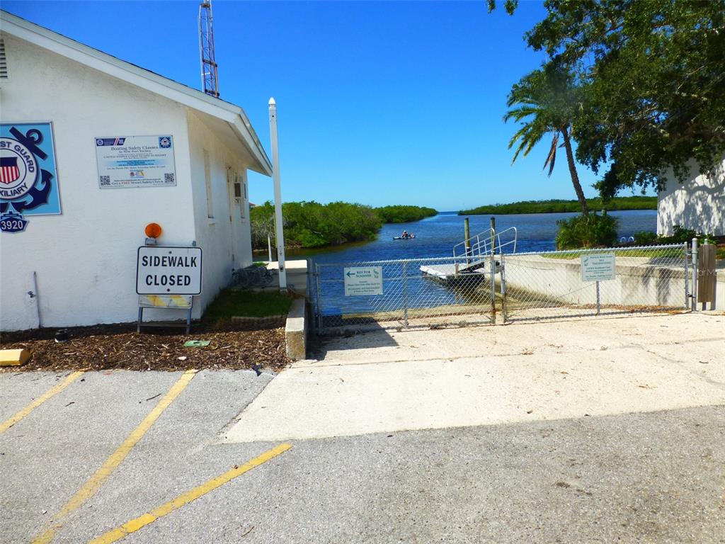 5557 Sea Forest Drive, Unit 215 New Port Richey, FL 34652 - Photo 39 of 42 a view of a street with wooden fence