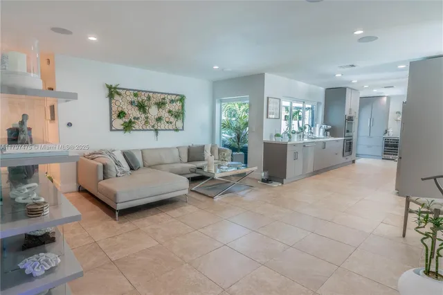 a living room with furniture and window