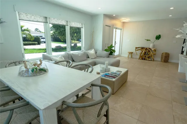 a living room with furniture and window