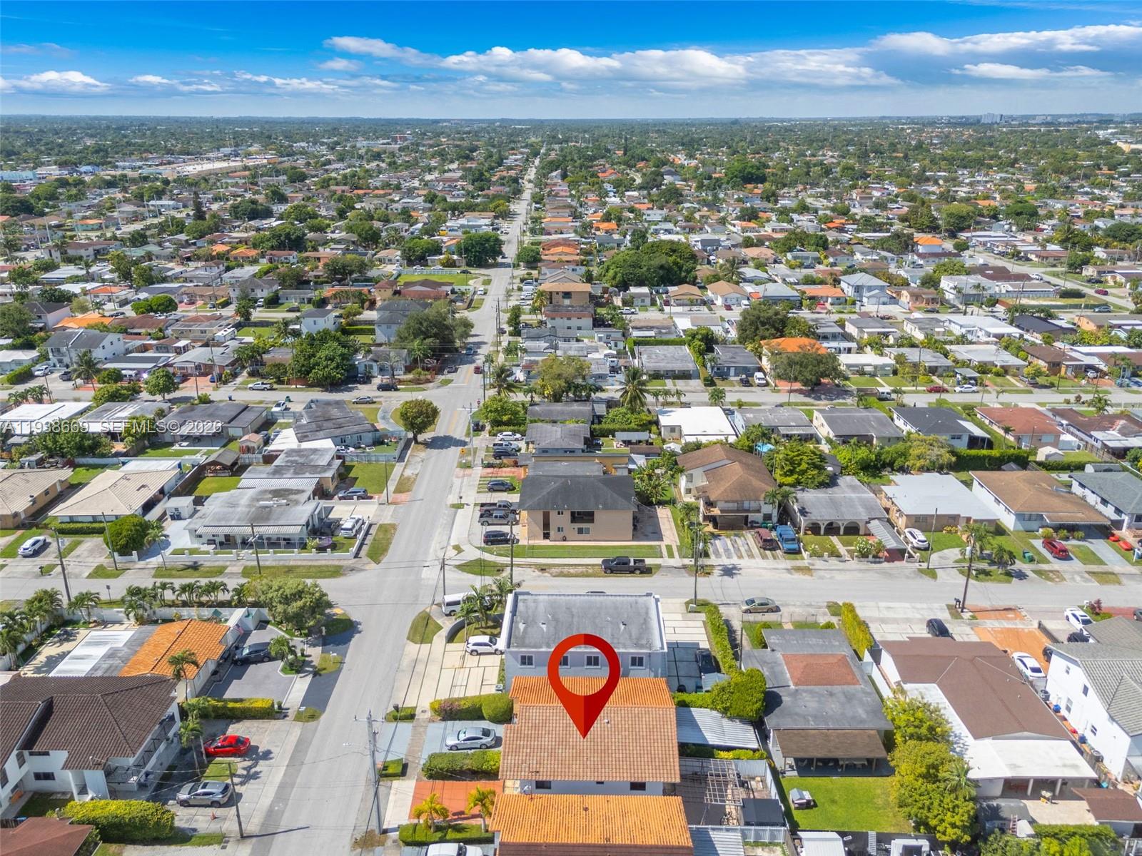 8773 Southwest 36th Street Miami, FL 33165 - Photo 40 of 47 an aerial view of residential building and parking space