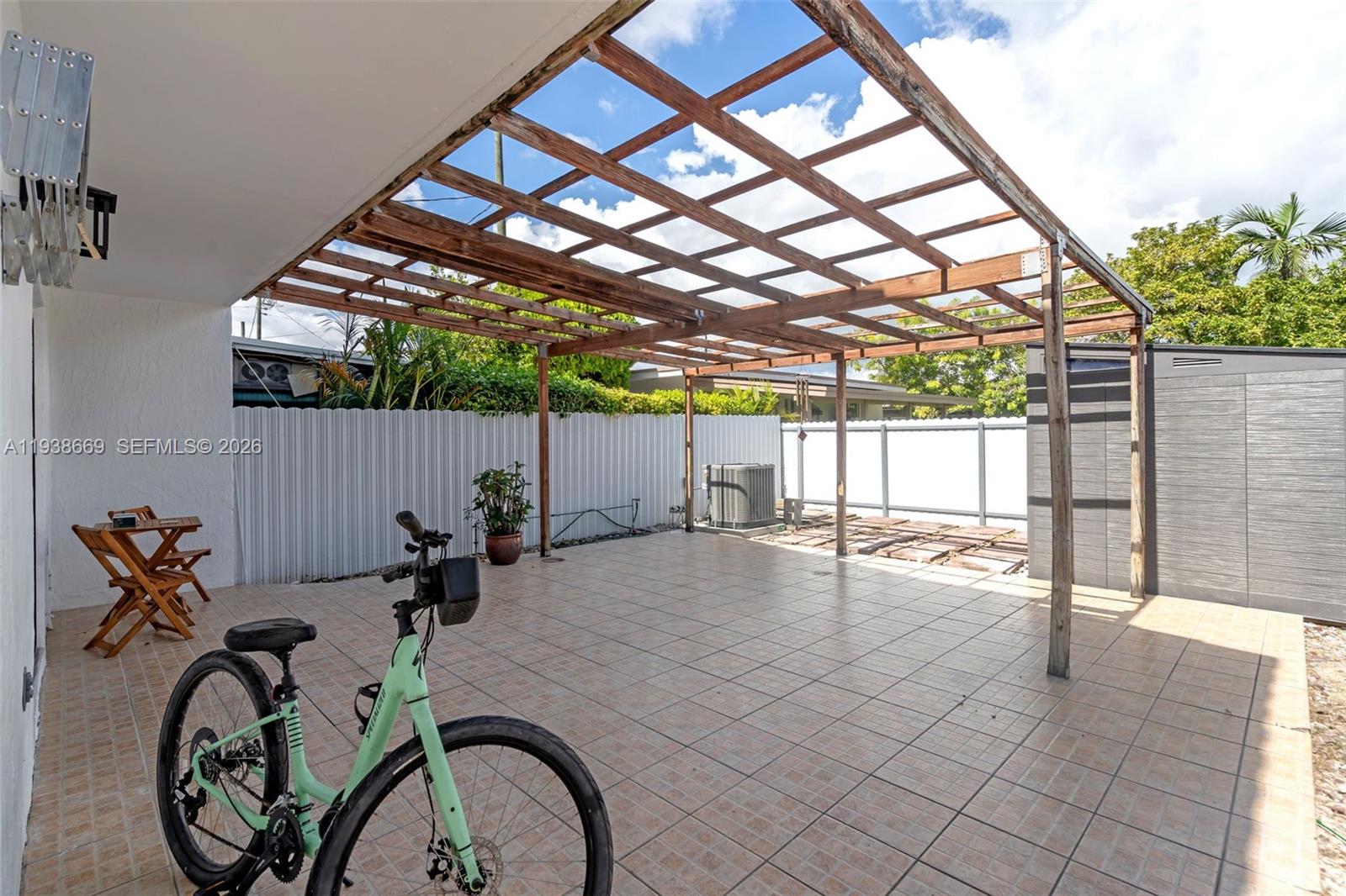 8773 Southwest 36th Street Miami, FL 33165 - Photo 47 of 47 a view of a room with gym equipment