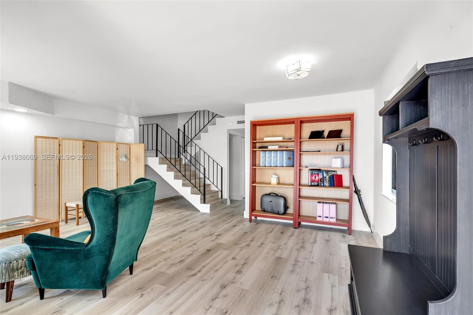 8773 Southwest 36th Street Miami, FL 33165 - Photo 9 of 47 a living room with furniture and a wooden floor
