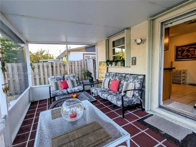 a view of a backyard with a tub