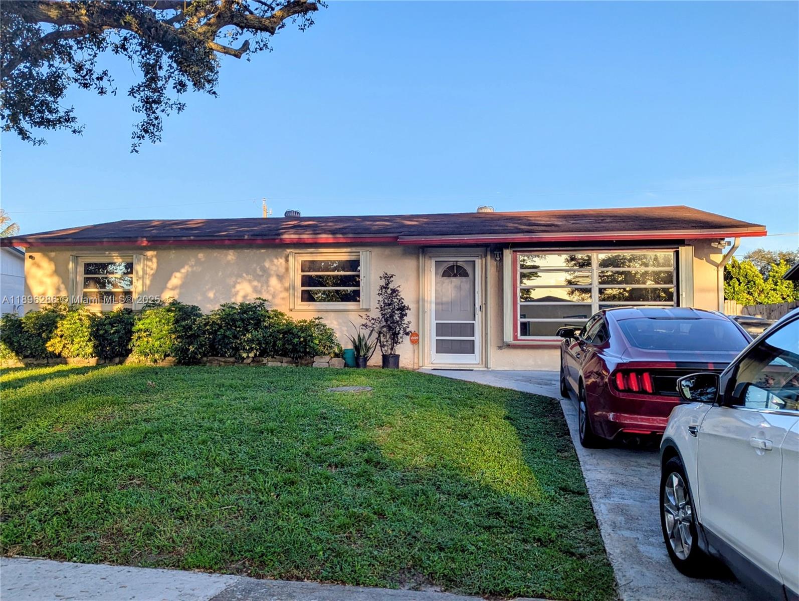 3031 Northwest 74th Avenue Hollywood, FL 33024 - Photo 2 of 34 a view of a house with backyard and porch