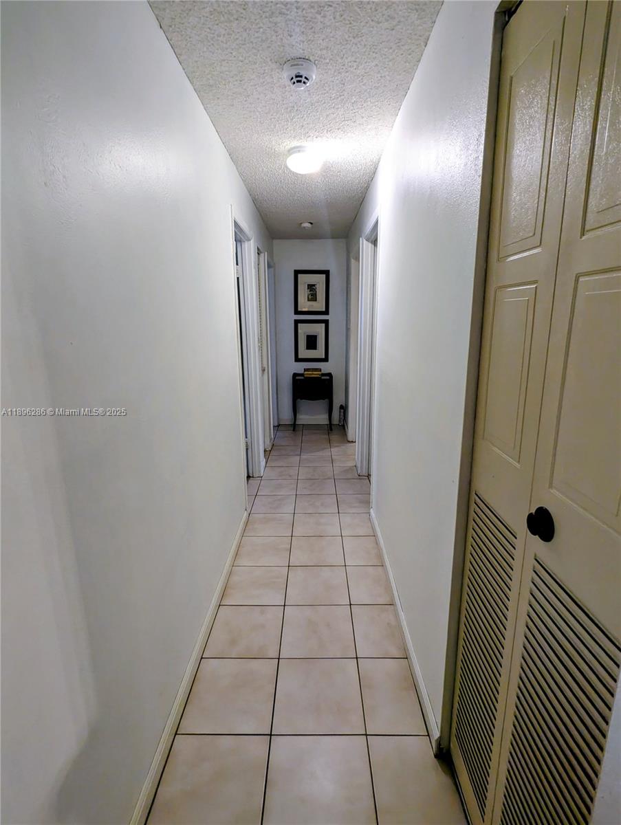 3031 Northwest 74th Avenue Hollywood, FL 33024 - Photo 22 of 34 a view of a hallway