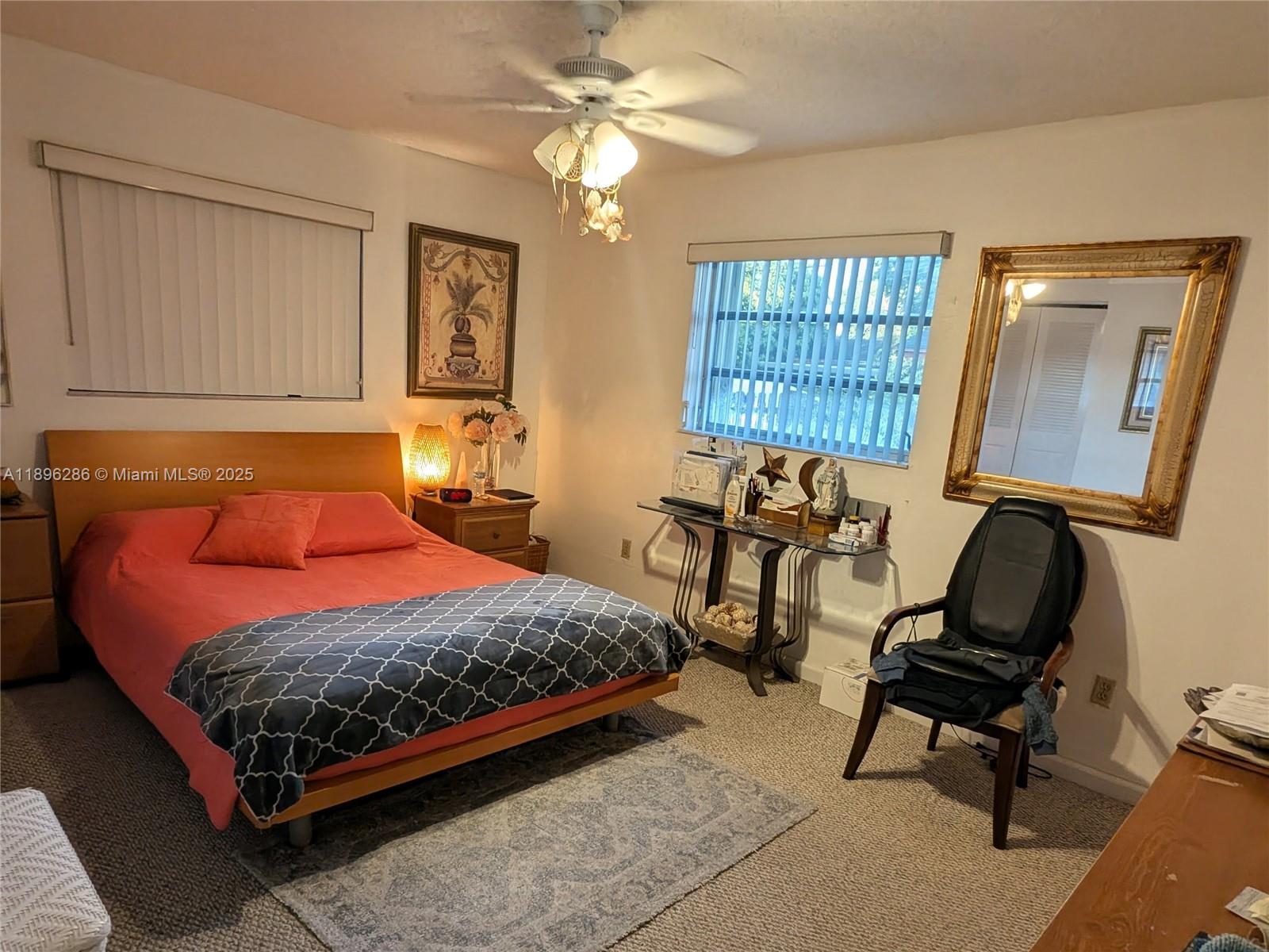 3031 Northwest 74th Avenue Hollywood, FL 33024 - Photo 23 of 34 a bedroom with a bed and a window