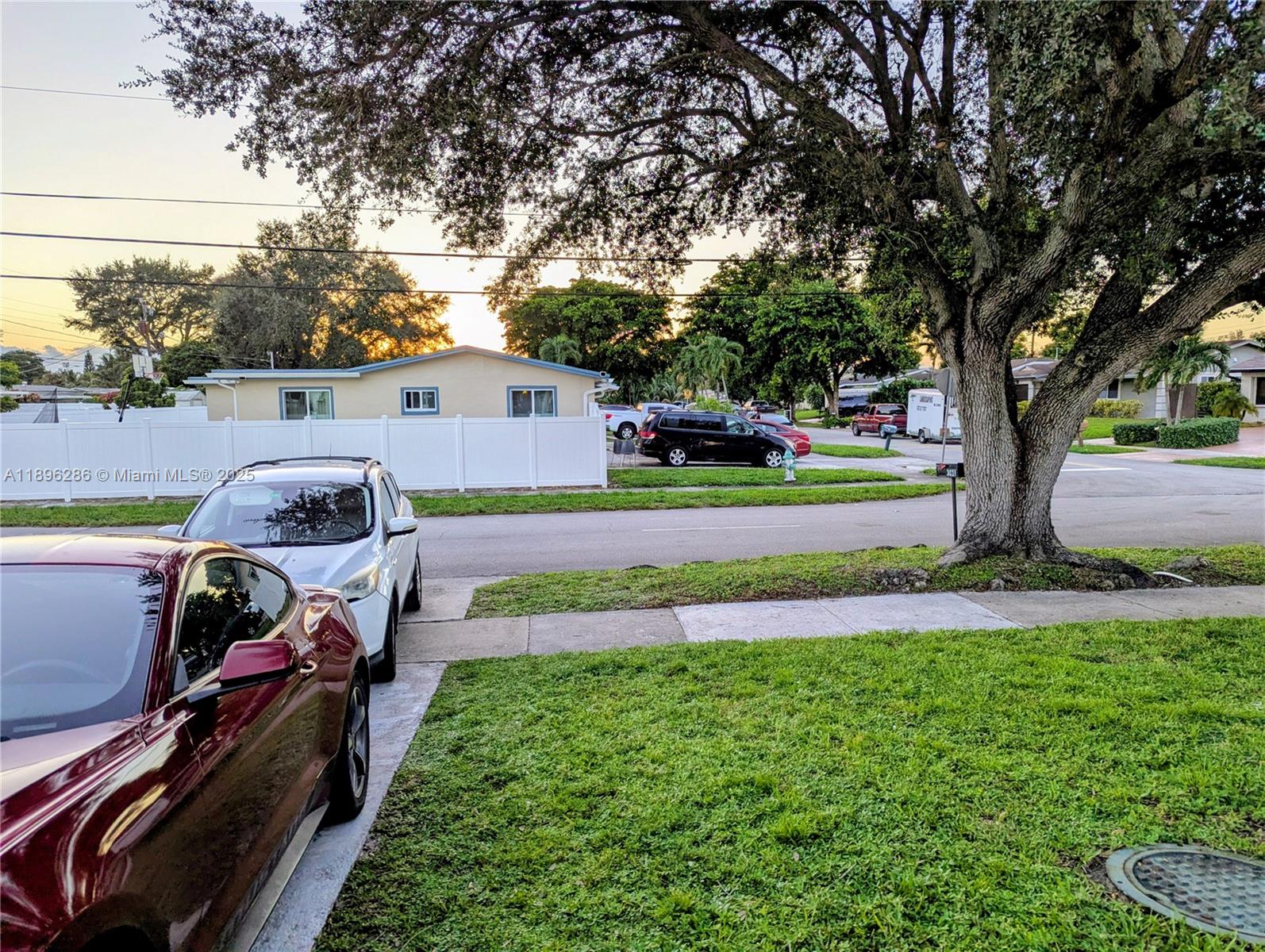 3031 Northwest 74th Avenue Hollywood, FL 33024 - Photo 3 of 34 a view of a garden with wooden fence