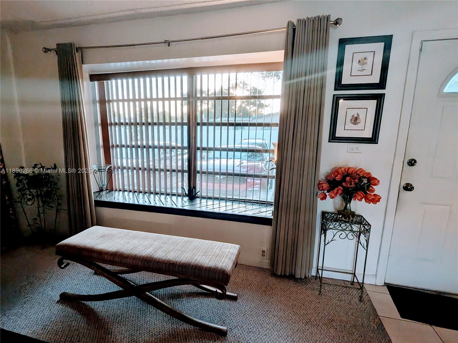 3031 Northwest 74th Avenue Hollywood, FL 33024 - Photo 6 of 34 a bedroom with furniture and a window