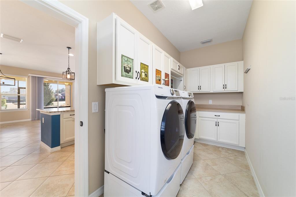 5670 Northwest 39th Lane Ocala, FL 34482 - Photo 38 of 61 a utility room with sink dryer and washer