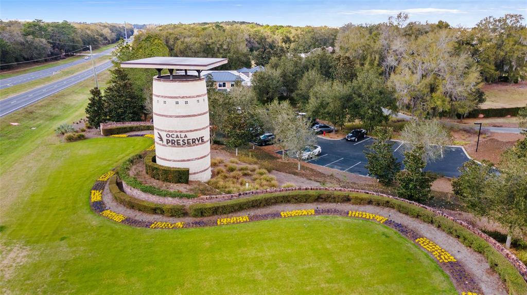 5670 Northwest 39th Lane Ocala, FL 34482 - Photo 50 of 61 a swimming pool with trees in the background