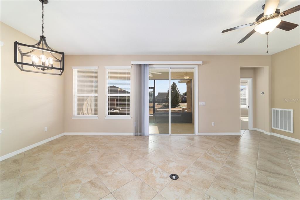 5670 Northwest 39th Lane Ocala, FL 34482 - Photo 6 of 61 a view of an empty room with a window