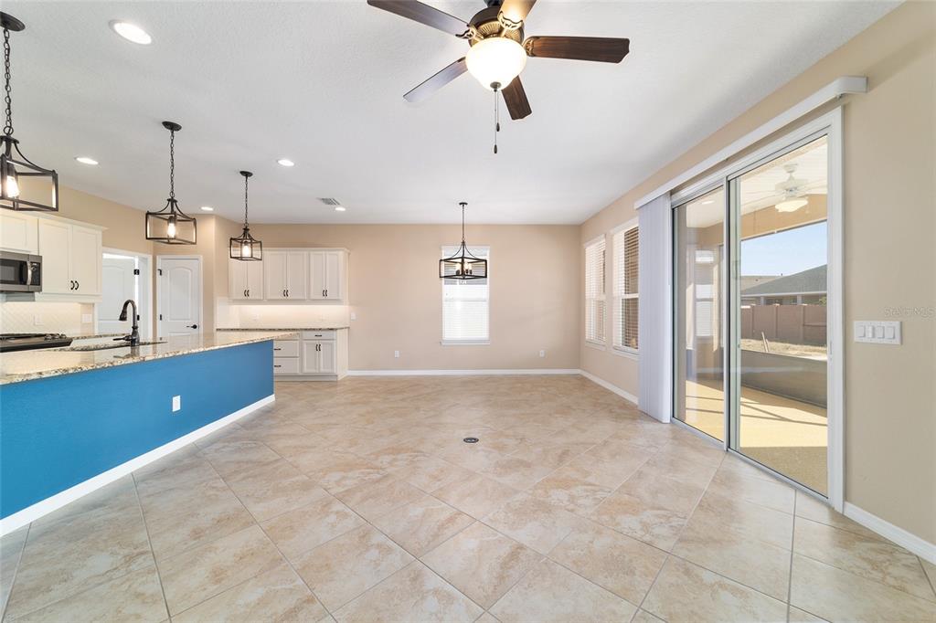 5670 Northwest 39th Lane Ocala, FL 34482 - Photo 8 of 61 a view of a kitchen with a sink and a window
