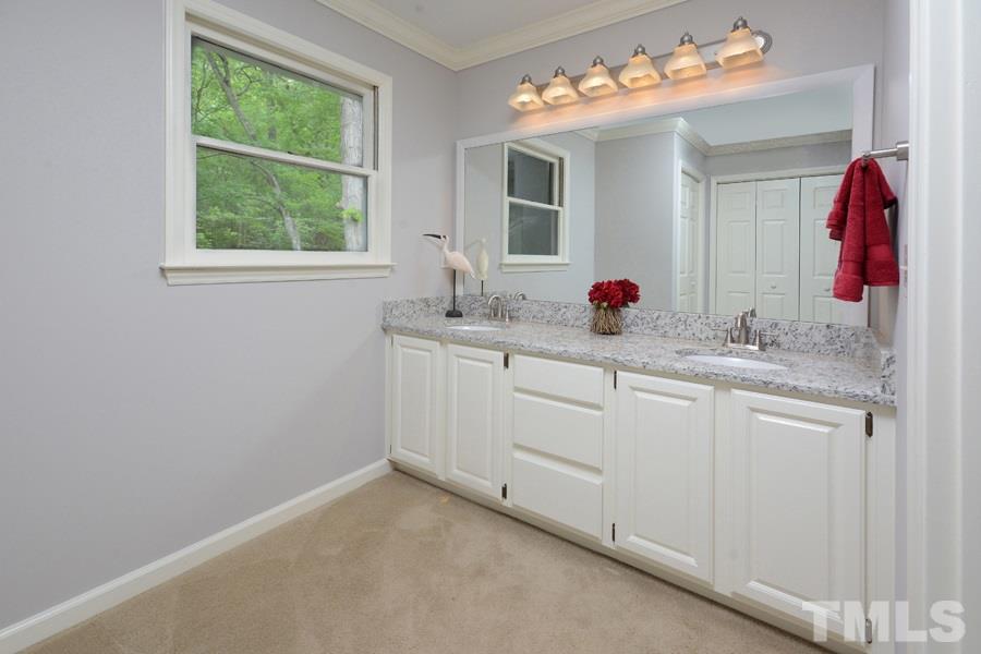 5619 Red Coach Road Durham, NC 27712 - Photo 17 of 30 New granite countertops, freshly painted cabinets