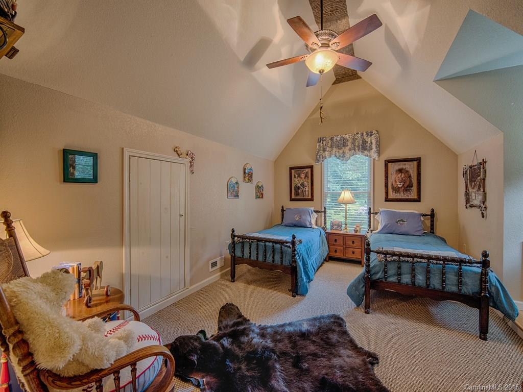 541 Chinquapin Road Canton, NC 28716 - Photo 21 of 23 a living room with furniture and a chandelier