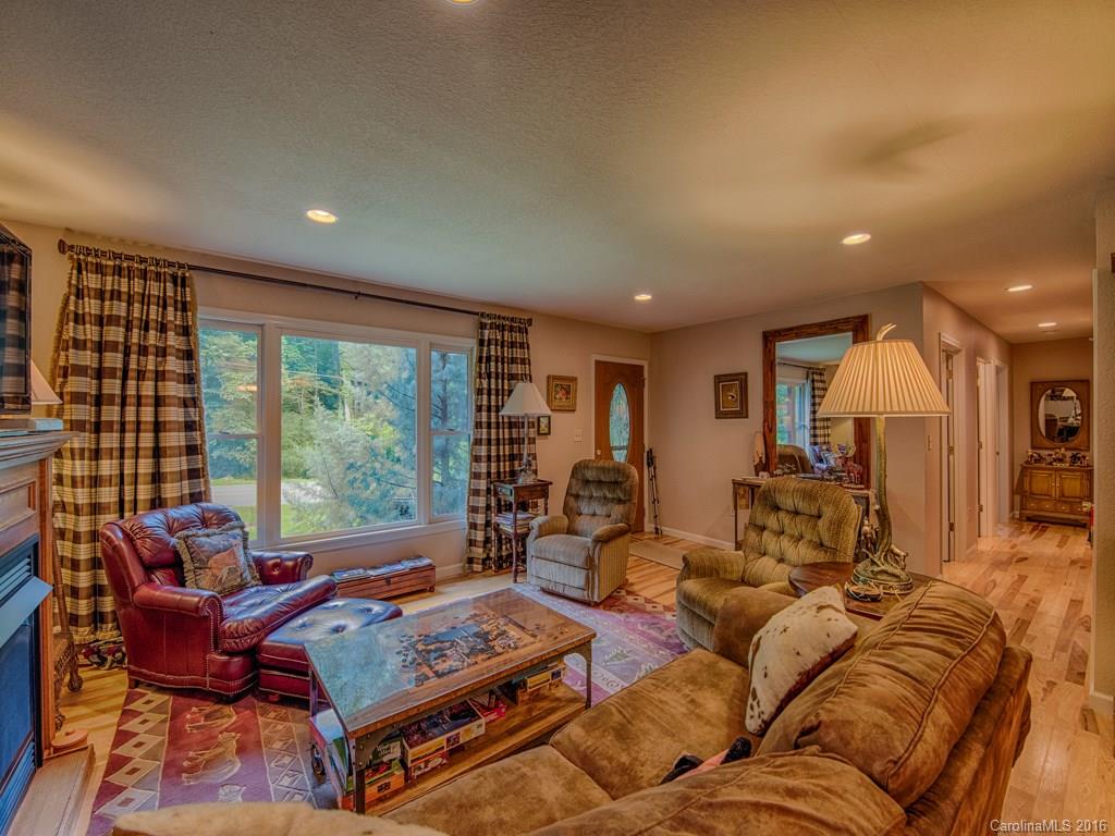 541 Chinquapin Road Canton, NC 28716 - Photo 8 of 23 a living room with furniture and a large window