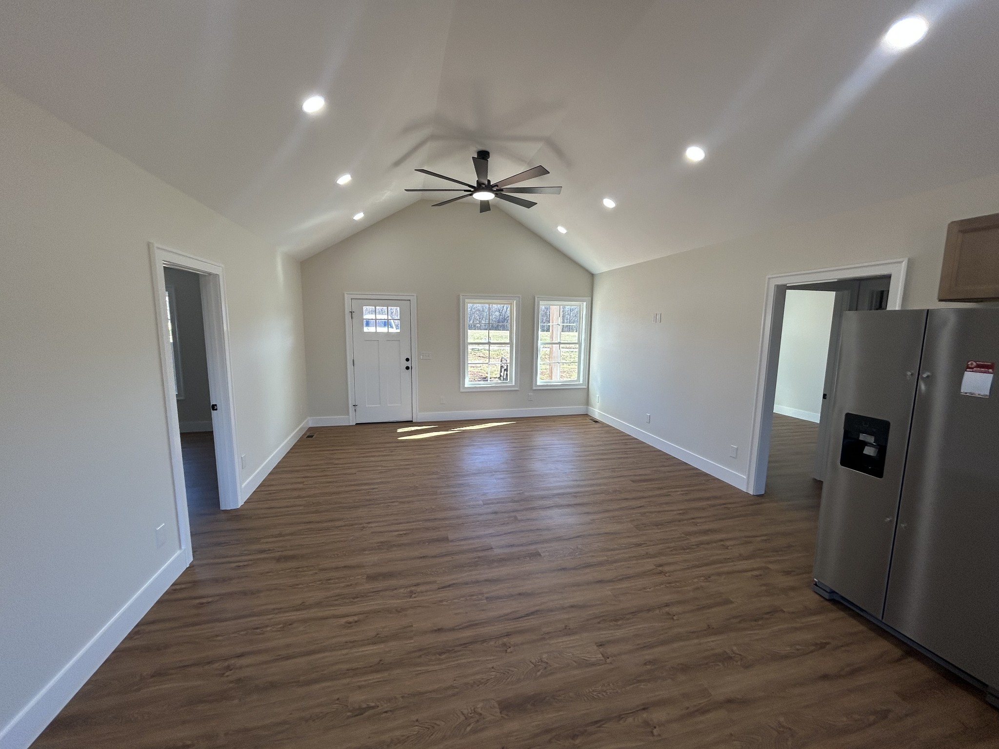 614 Haddon Lane Winchester, TN 37398 - Photo 2 of 12 a view of a livingroom with wooden floor and staircase