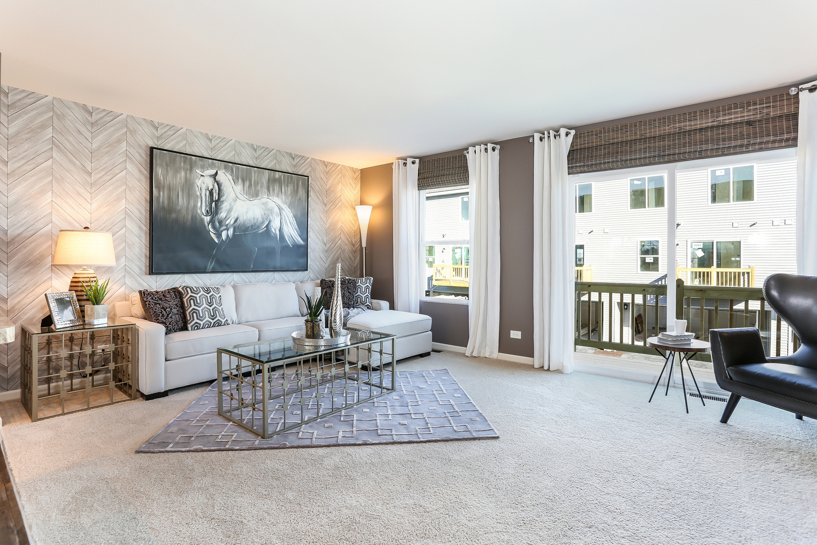2350 Upland Road, Unit 2276 Pingree Grove, IL 60140 - Photo 4 of 18 a living room with furniture and large windows