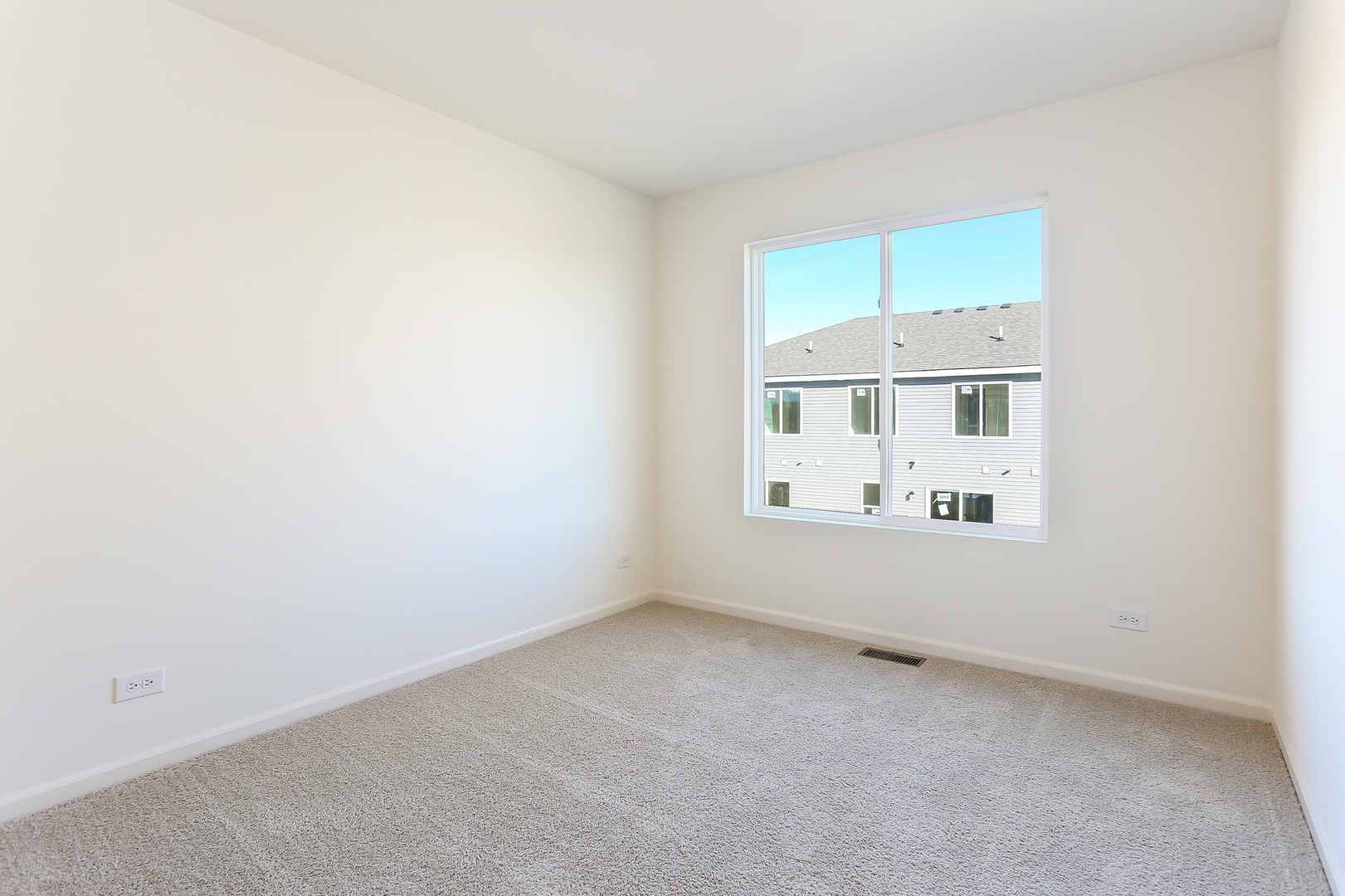 2350 Upland Road, Unit 2276 Pingree Grove, IL 60140 - Photo 8 of 18 an empty room with a window