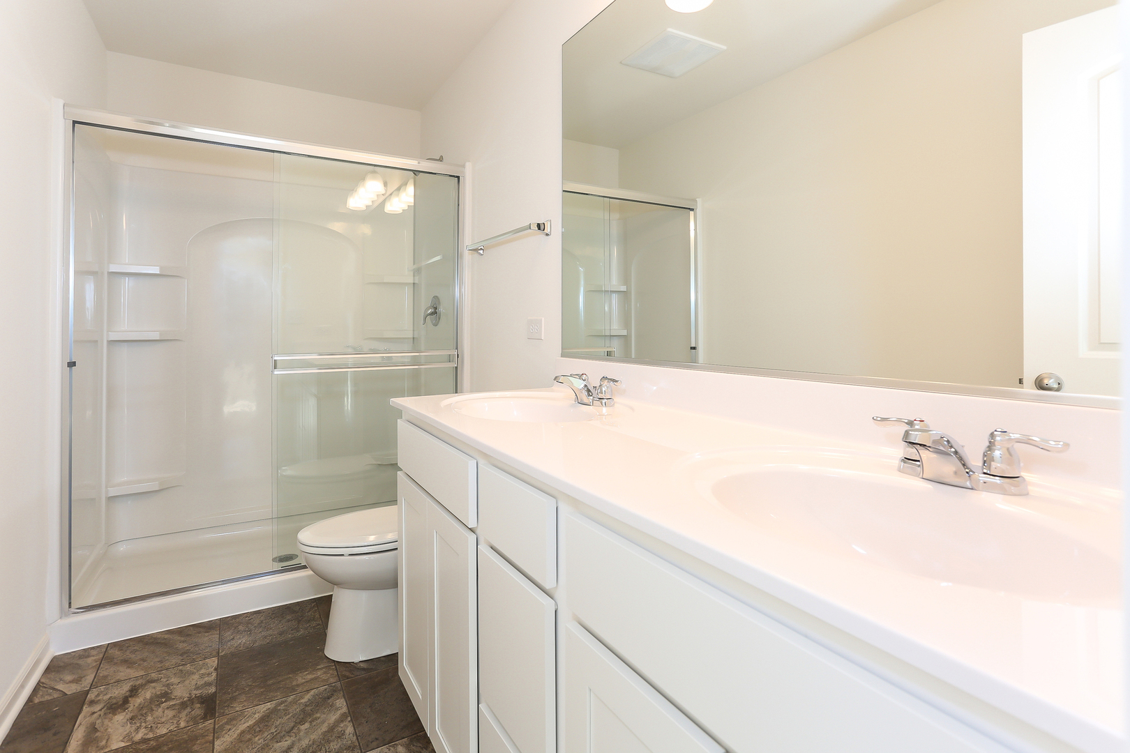 2350 Upland Road, Unit 2276 Pingree Grove, IL 60140 - Photo 9 of 18 a bathroom with a sink toilet and shower