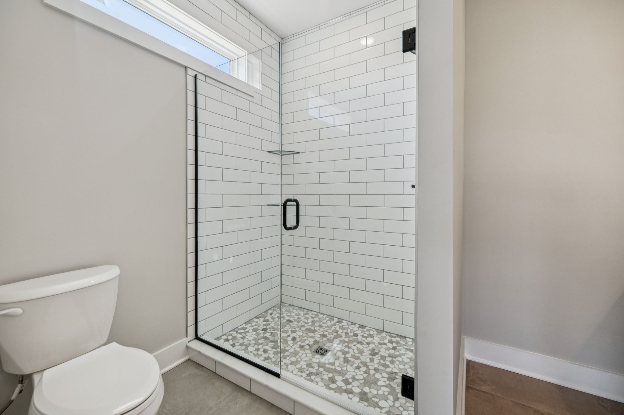 117 East Campbell Road, Unit A Madison, TN 37115 - Photo 22 of 29 a bathroom with a toilet and shower